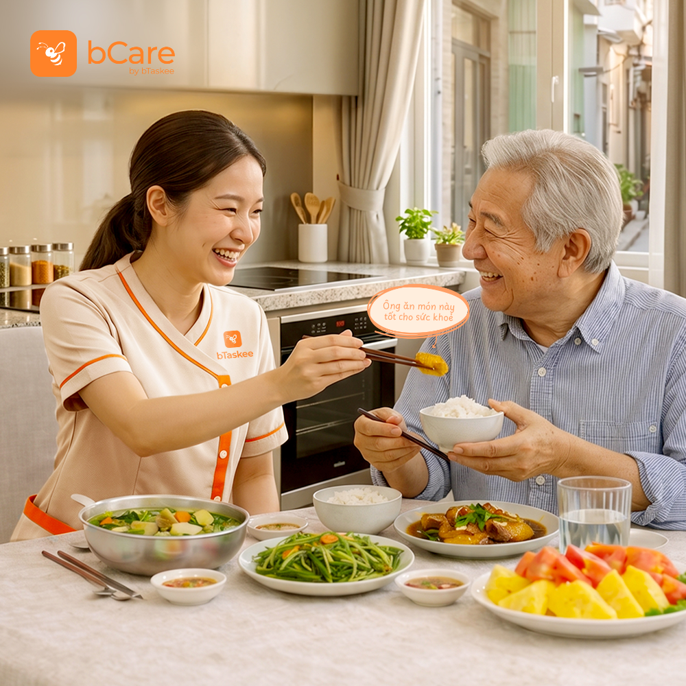 bCare Tasker sharing a meal with an elderly man
